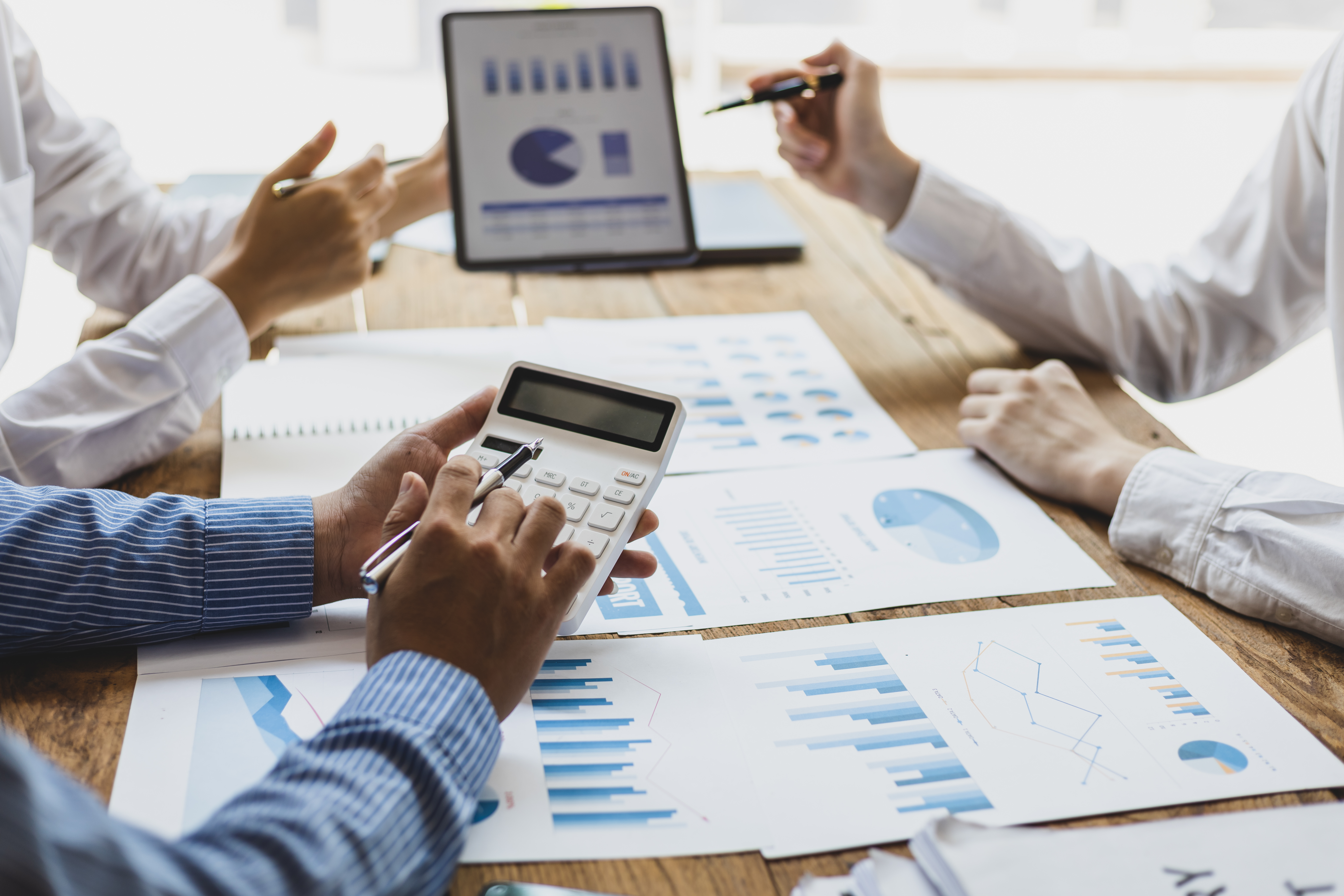 Business valuation professionals in Jackson, MS, working on a client’s valuation